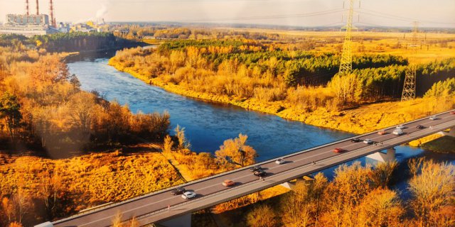 Construction of a bridge crossing over the Narew River with access roads